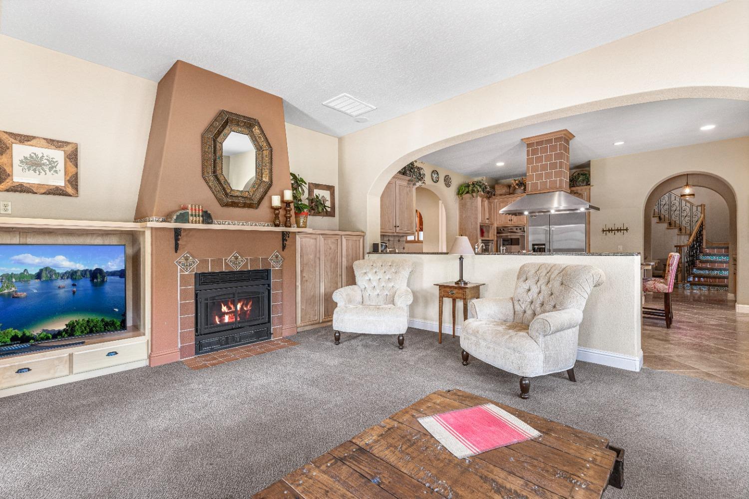 618 Elfers Road Patterson, CA 95363 - Photo 59 of 79 a living room with furniture and a fireplace