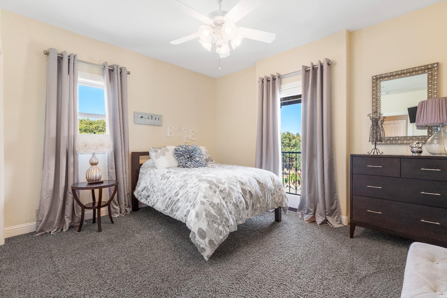 618 Elfers Road Patterson, CA 95363 - Photo 67 of 79 a bedroom with a bed and a dresser