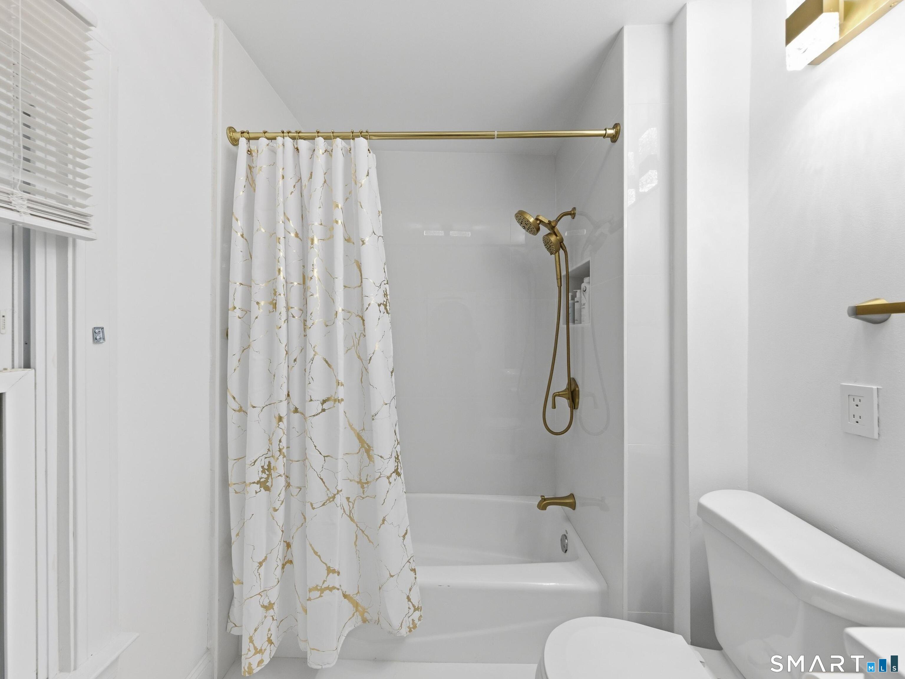 115 Wilton Road, Unit 1 Westport, CT 06880 - Photo 12 of 17 Full bathroom with tub/shower