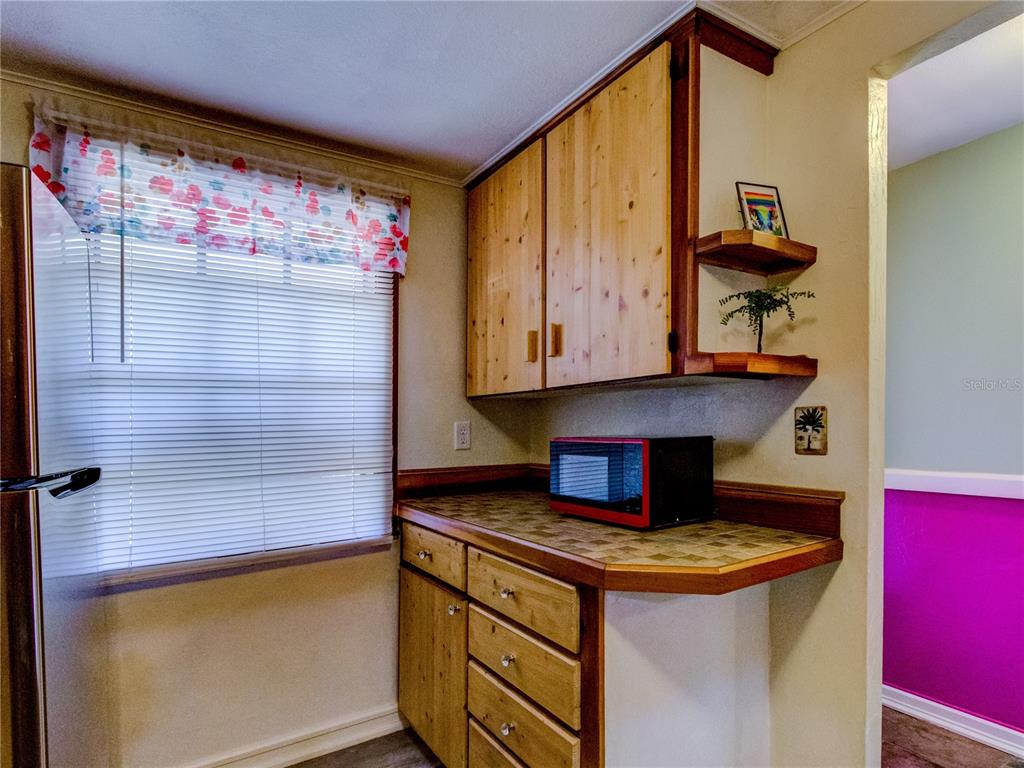 Undisclosed Address New Port Richey, FL 34652 - Photo 12 of 48 a bathroom with a sink and a mirror
