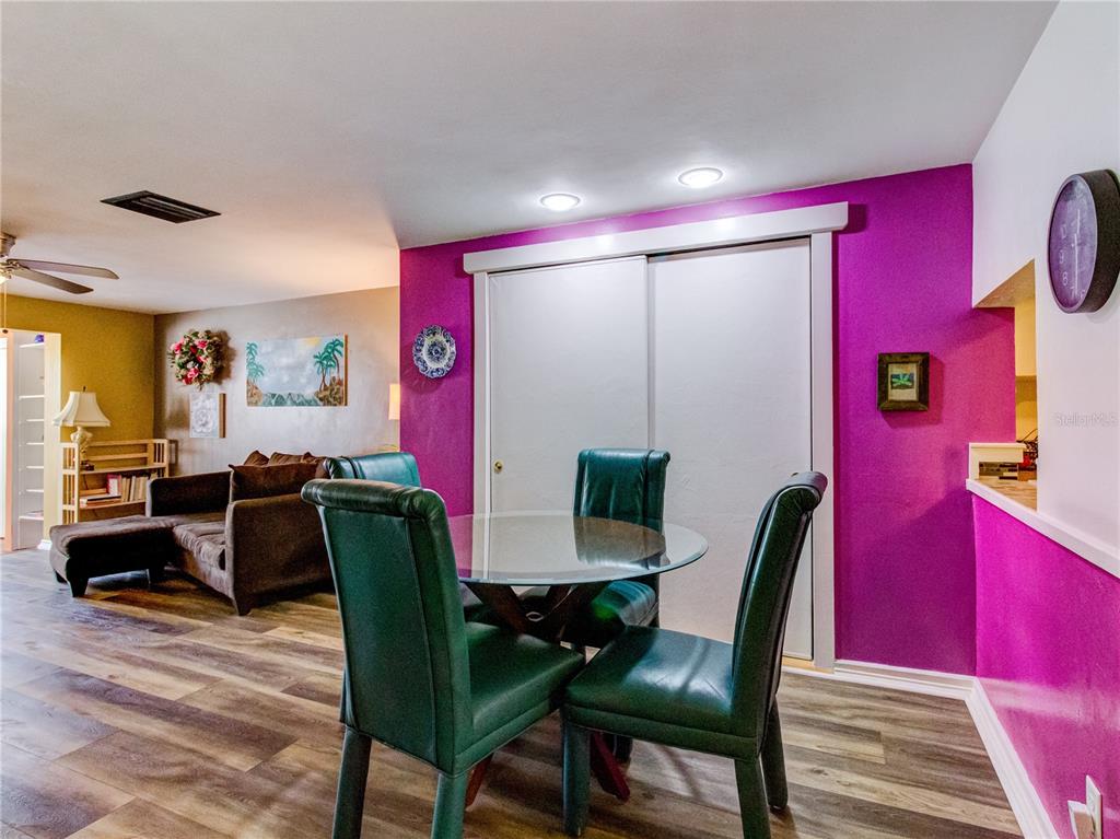 Undisclosed Address New Port Richey, FL 34652 - Photo 13 of 48 a view of a dining room with furniture
