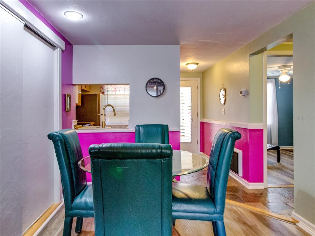 Undisclosed Address New Port Richey, FL 34652 - Photo 15 of 48 a view of a room with furniture and wooden floor