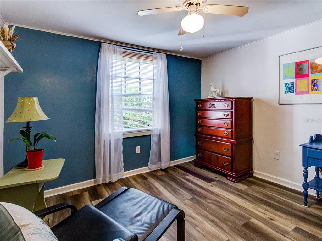 Undisclosed Address New Port Richey, FL 34652 - Photo 28 of 48 a room with furniture and a window