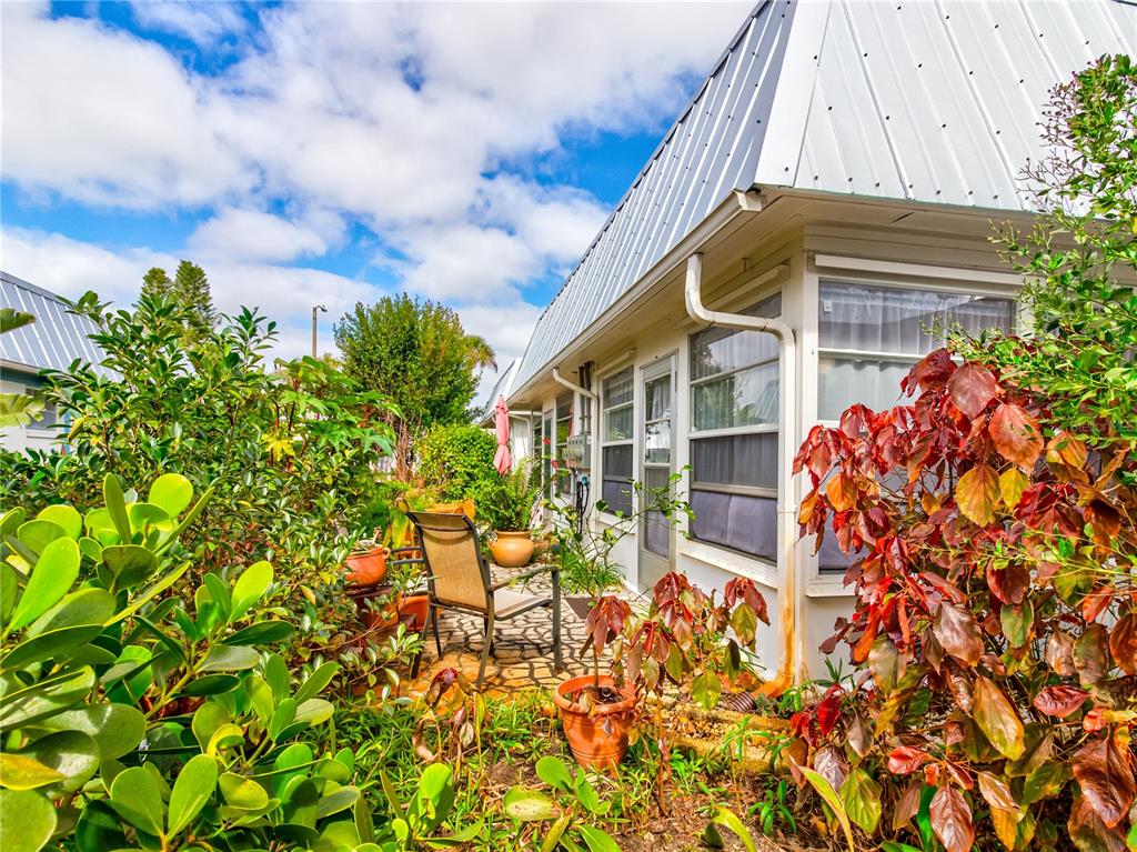 Undisclosed Address New Port Richey, FL 34652 - Photo 35 of 48 a view of a chair and table in the backyard
