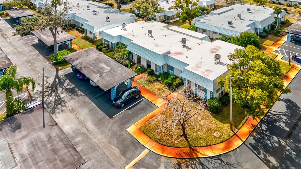 Undisclosed Address New Port Richey, FL 34652 - Photo 47 of 48 an aerial view of a house with a swimming pool