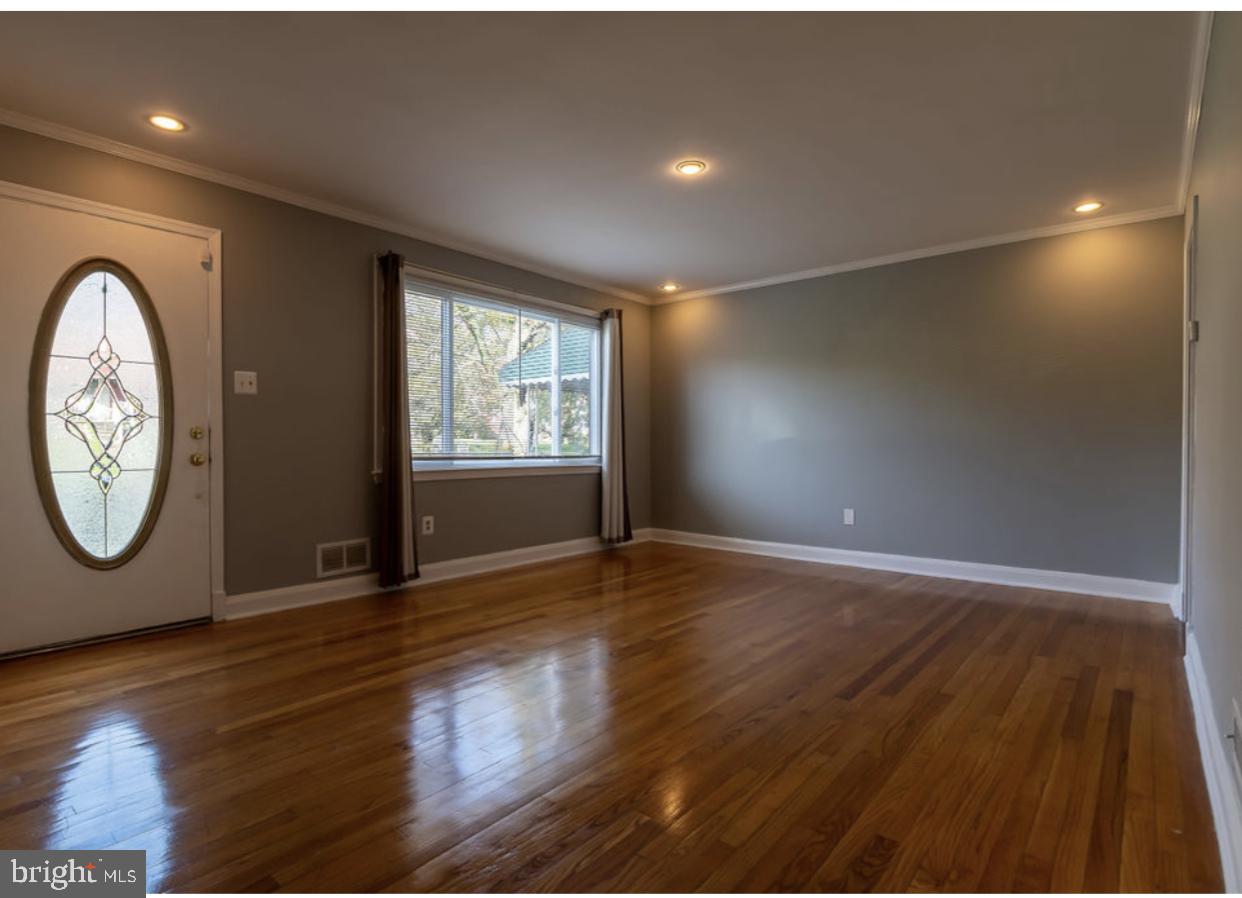 1609 Northbourne Road Baltimore, MD 21239 - Photo 2 of 33 Living Room with hardwood floors