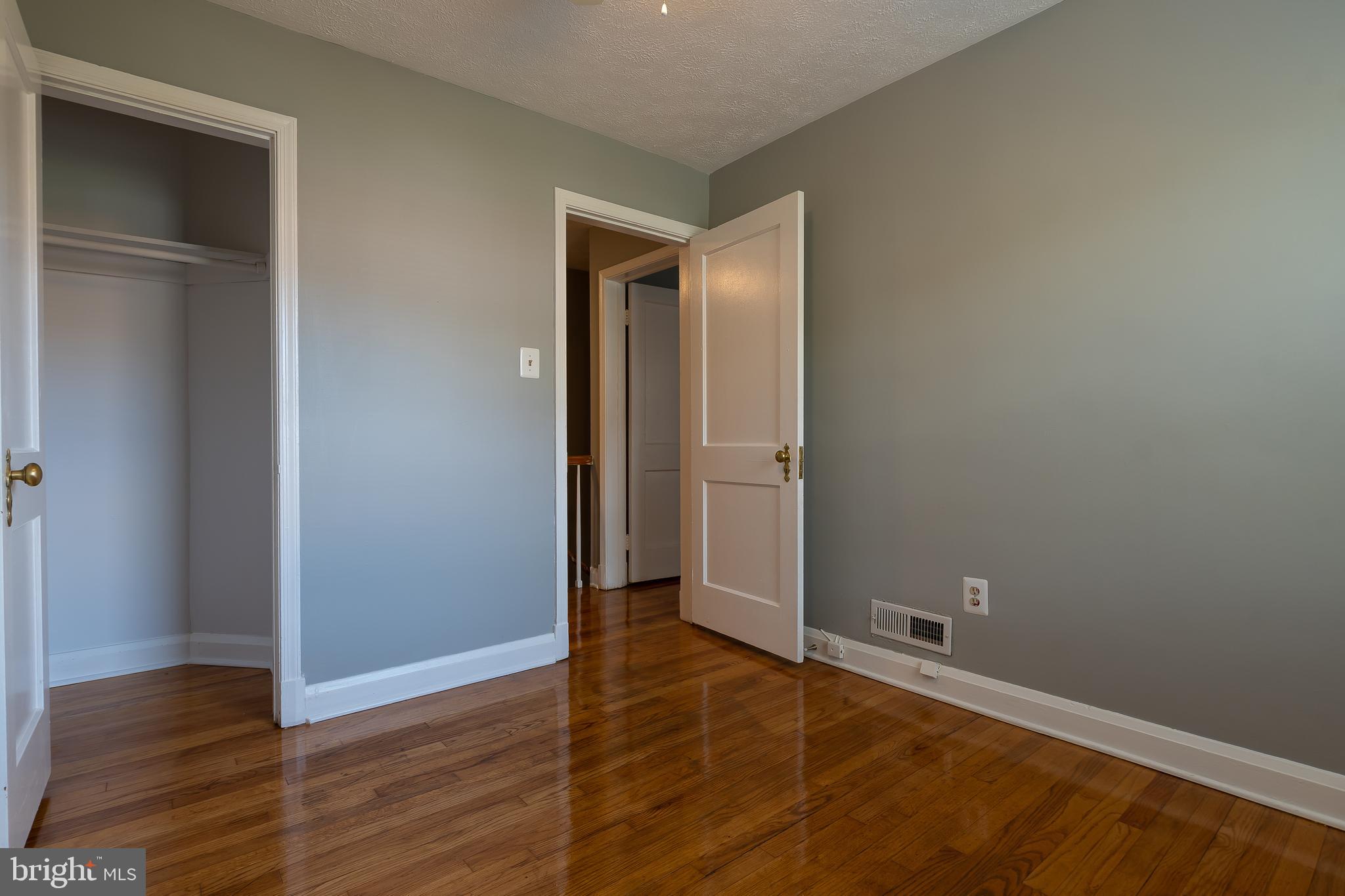 1609 Northbourne Road Baltimore, MD 21239 - Photo 3 of 33 beautiful room/ hardwood floors