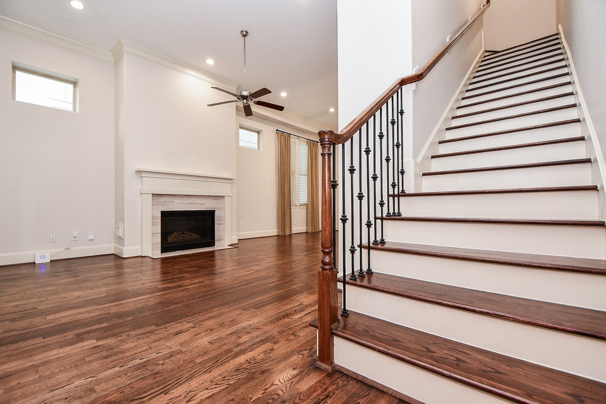 709 Delano Street Houston, TX 77003 - Photo 12 of 36 a view of entryway and hall with wooden floor