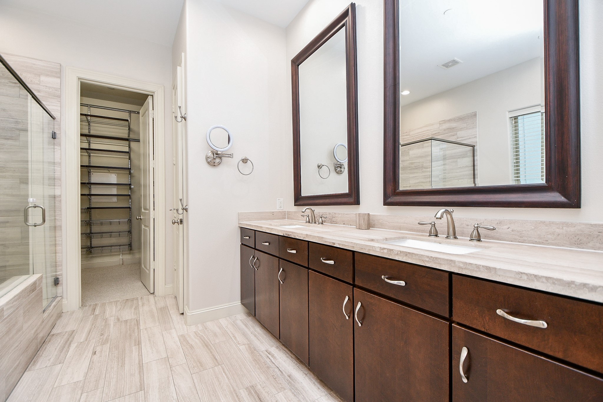 709 Delano Street Houston, TX 77003 - Photo 17 of 36 a bathroom with a double vanity sink and mirror