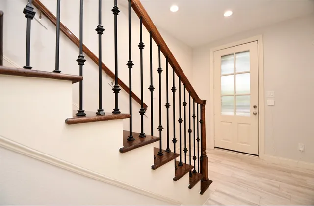 a front view of a building with a door and a shower