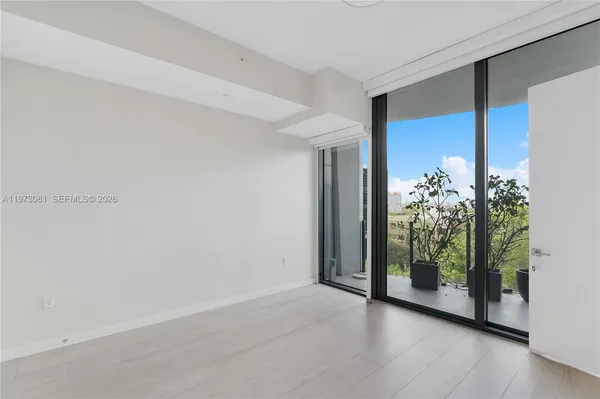 a terrace with outdoor seating and green space