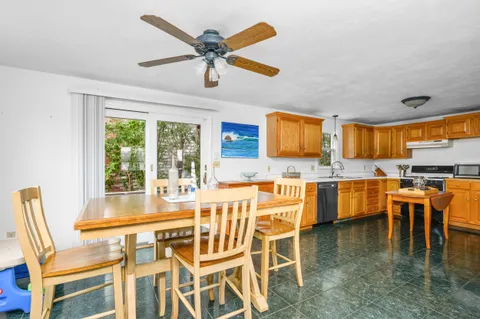 an aerial view of multiple house with yard