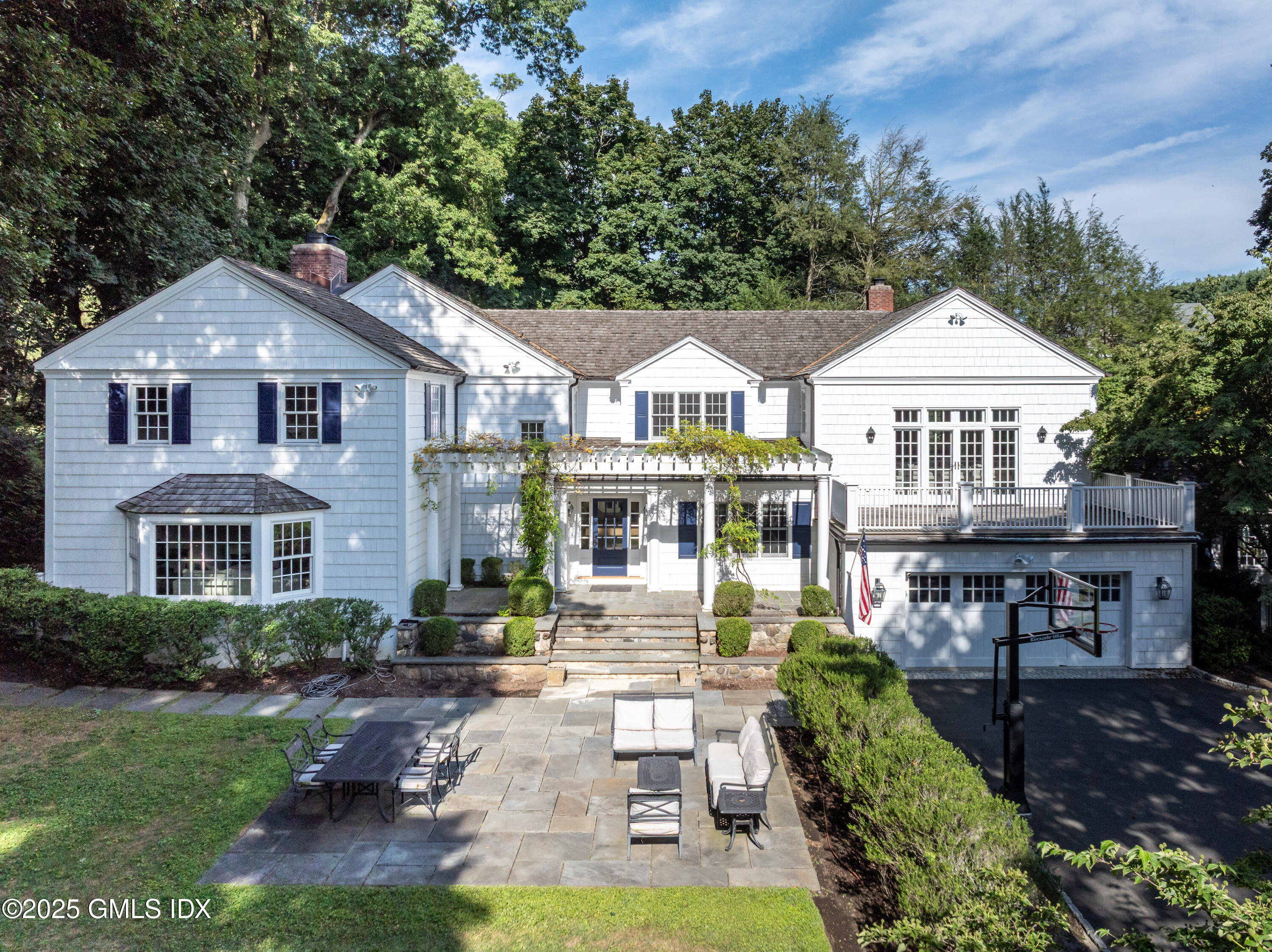 40 Ridgeview Avenue Greenwich, CT 06830 - Photo 1 of 38 a front view of house with yard and green space