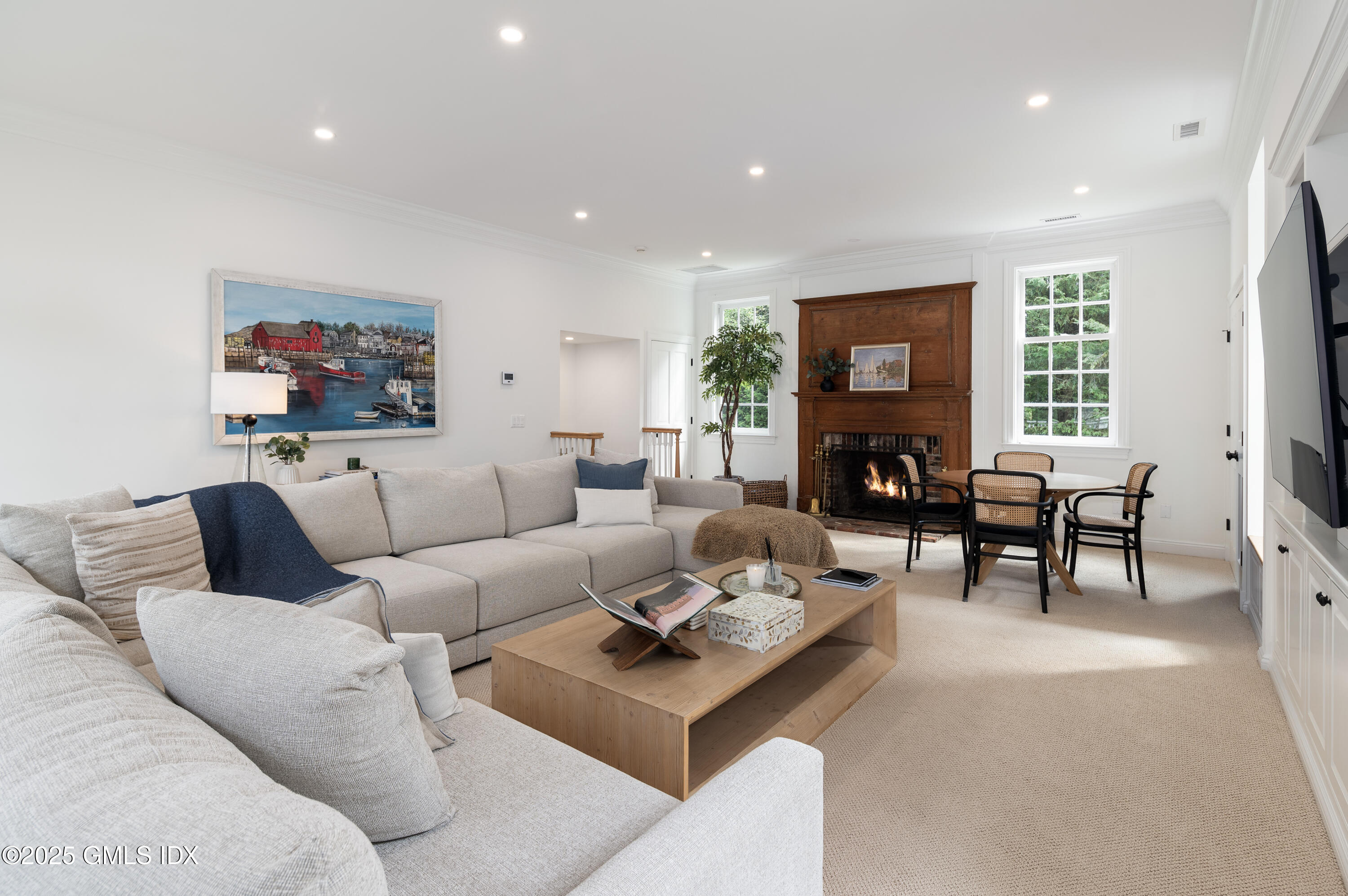 40 Ridgeview Avenue Greenwich, CT 06830 - Photo 16 of 38 a living room with furniture and a fireplace