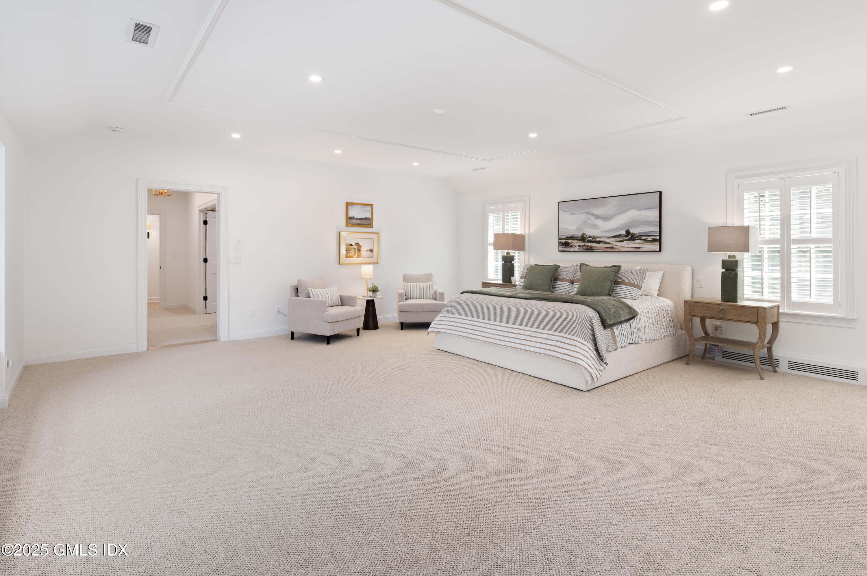40 Ridgeview Avenue Greenwich, CT 06830 - Photo 18 of 38 a bedroom with bed and white cabinets