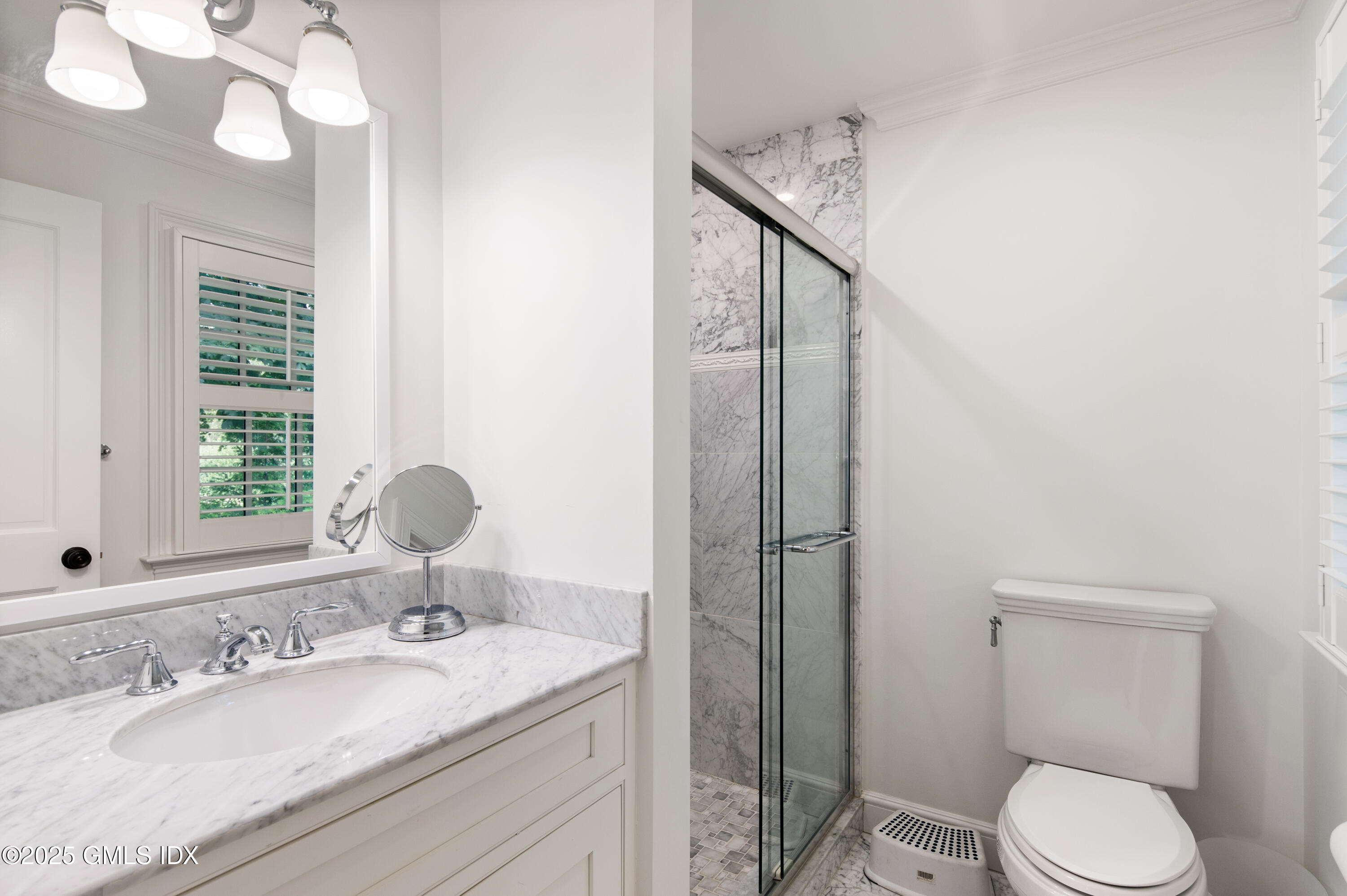 40 Ridgeview Avenue Greenwich, CT 06830 - Photo 22 of 38 a bathroom with a granite countertop sink toilet and shower