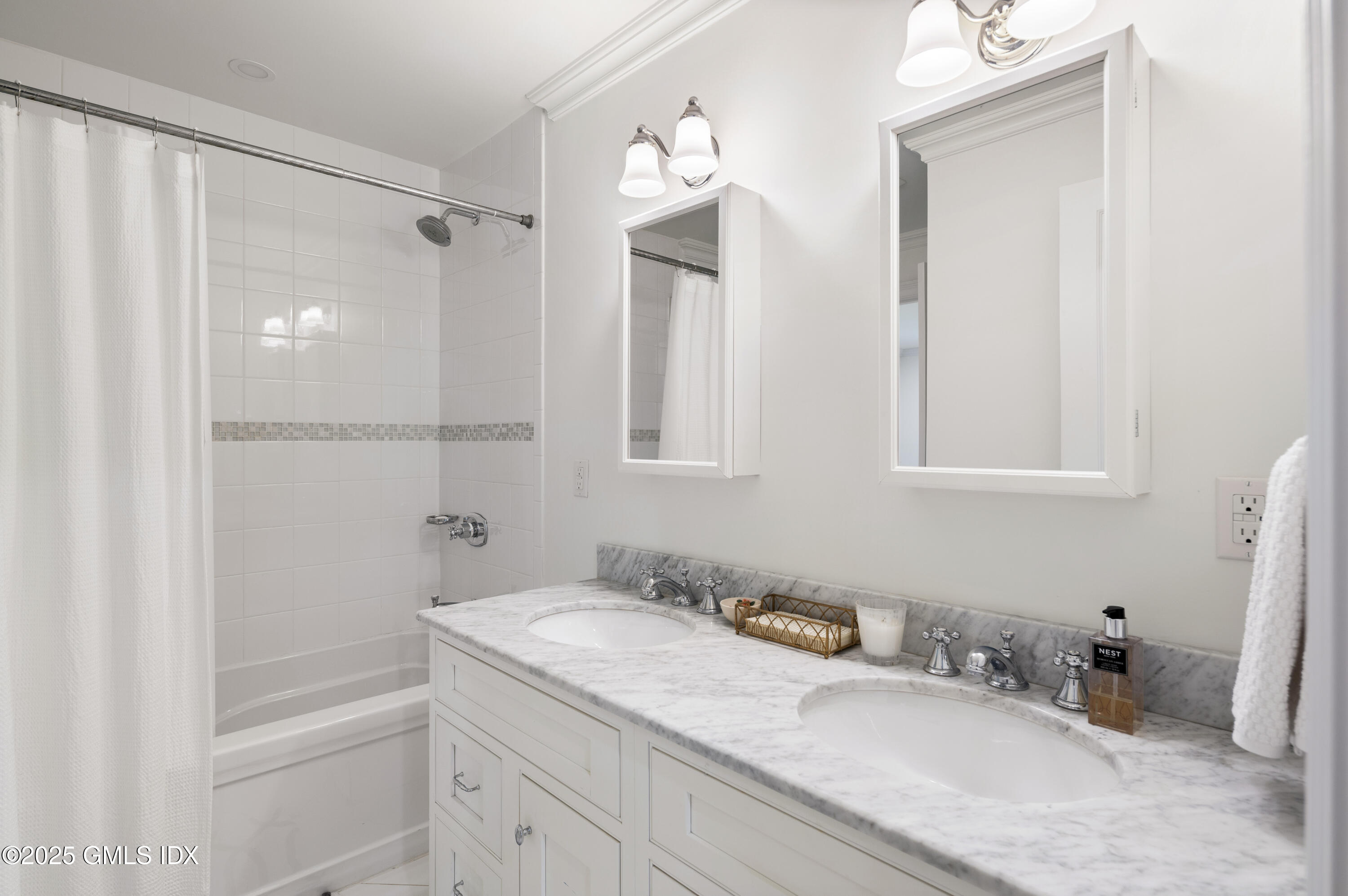 40 Ridgeview Avenue Greenwich, CT 06830 - Photo 25 of 38 a bathroom with a granite countertop sink a mirror a vanity and a bathtub