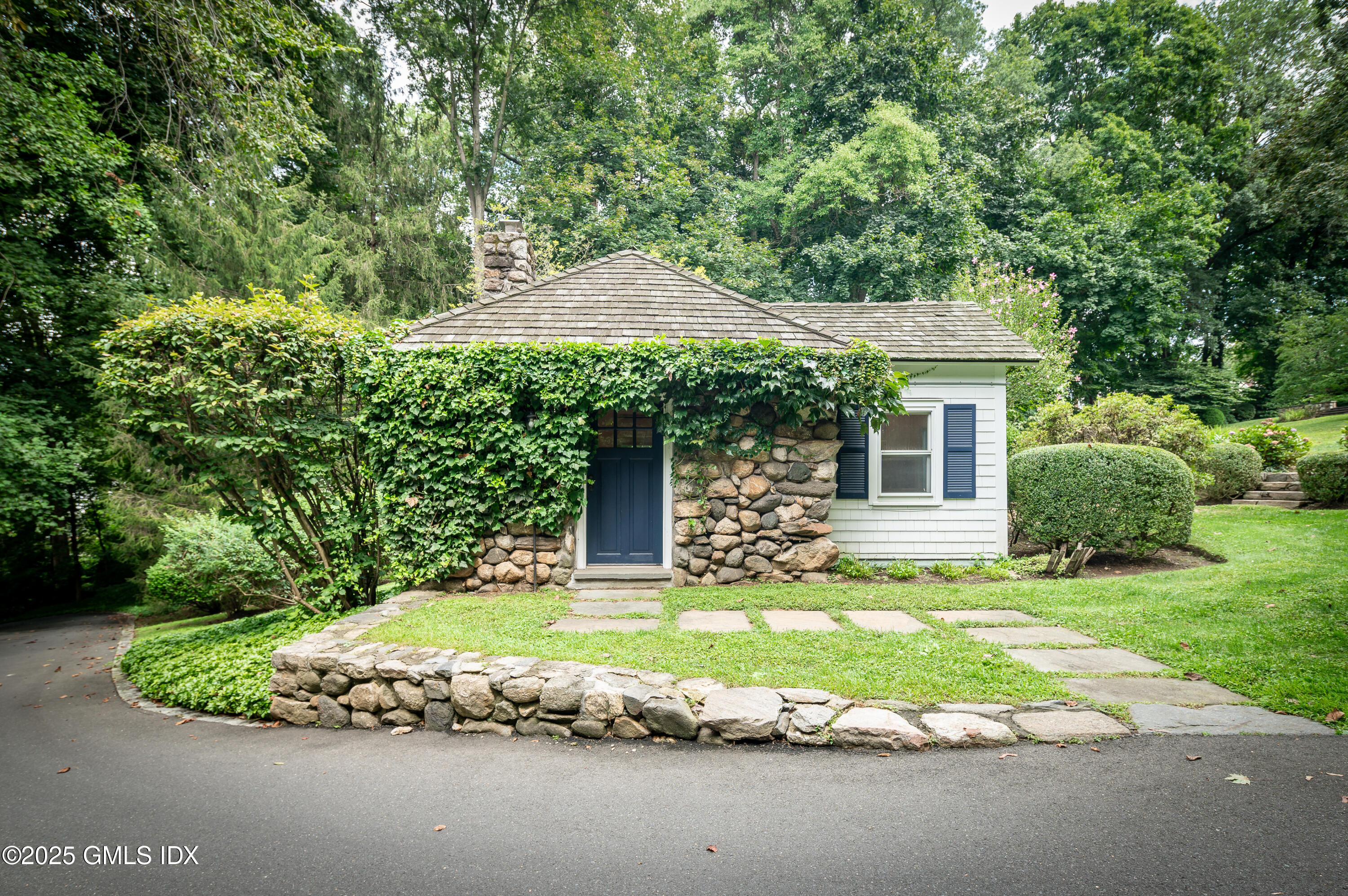40 Ridgeview Avenue Greenwich, CT 06830 - Photo 34 of 38 a house with trees in the background
