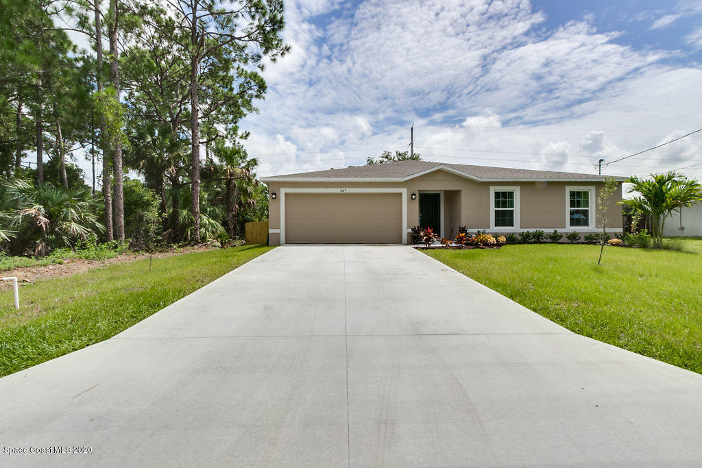 1443 Saxony Road Southwest Palm Bay, FL 32908 - Photo 1 of 21 Front