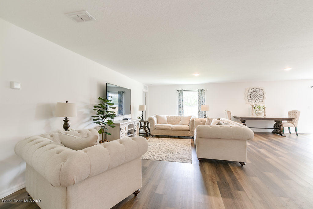 1443 Saxony Road Southwest Palm Bay, FL 32908 - Photo 4 of 21 Living 2
