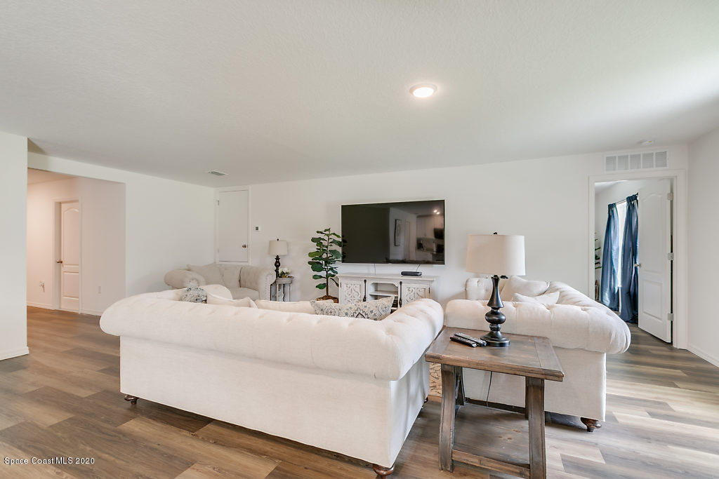 1443 Saxony Road Southwest Palm Bay, FL 32908 - Photo 5 of 21 Living 3