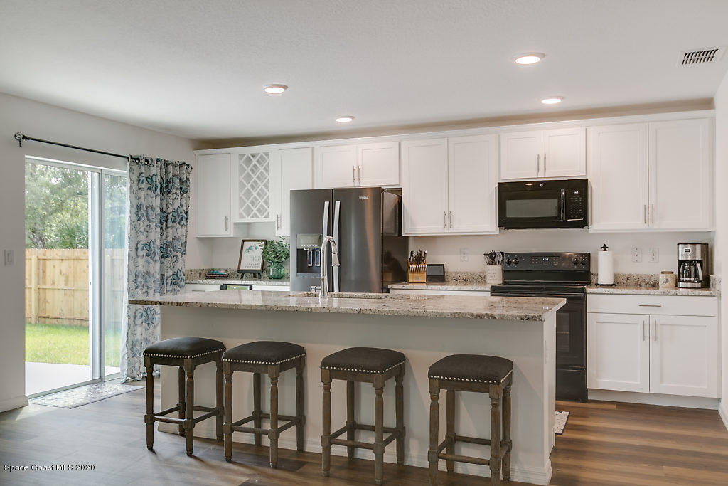 1443 Saxony Road Southwest Palm Bay, FL 32908 - Photo 8 of 21 Kitchen 3