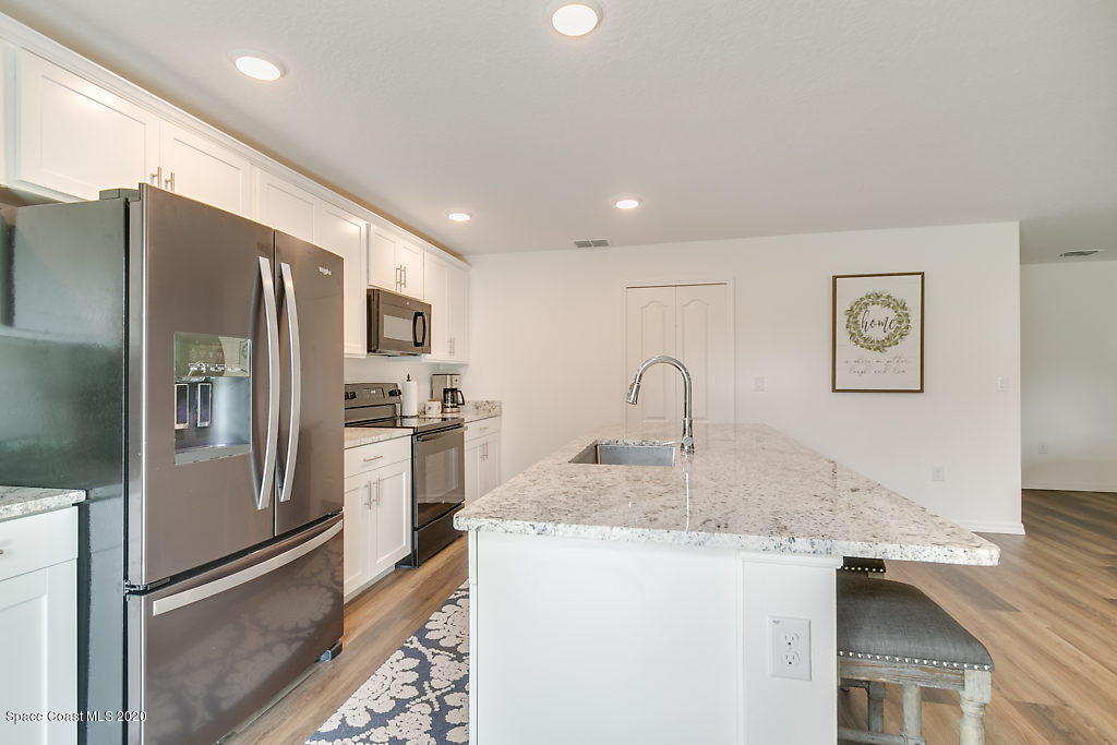 1443 Saxony Road Southwest Palm Bay, FL 32908 - Photo 9 of 21 Kitchen 4