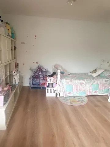 a very nice looking room with a large bed