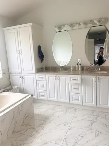 a view of a livingroom with wooden floor