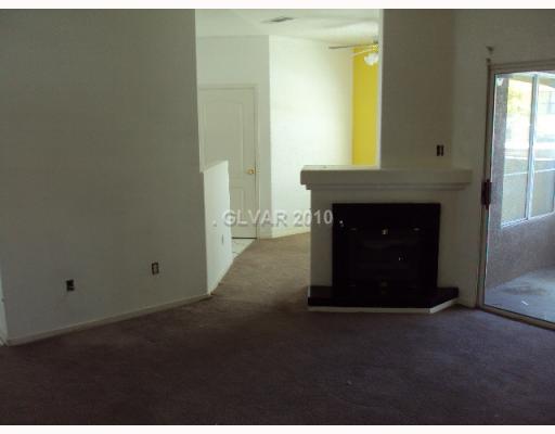 5525 West Flamingo Road, Unit 2012 Las Vegas, NV 89103 - Photo 2 of 4 Property Photo. Spacious living room with beautiful gas fireplace!