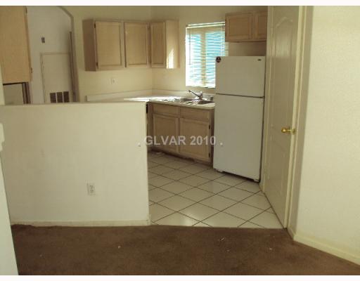 5525 West Flamingo Road, Unit 2012 Las Vegas, NV 89103 - Photo 3 of 4 Property Photo. Kitchen has all appliances with tile floors, laminate countertops & lots of cabinet spaces.