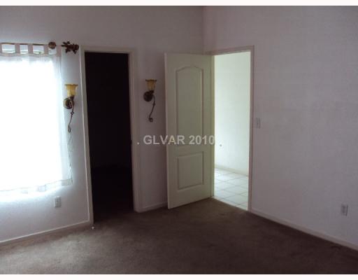 5525 West Flamingo Road, Unit 2012 Las Vegas, NV 89103 - Photo 4 of 4 Property Photo. Large master bedroom with walk-in closet.