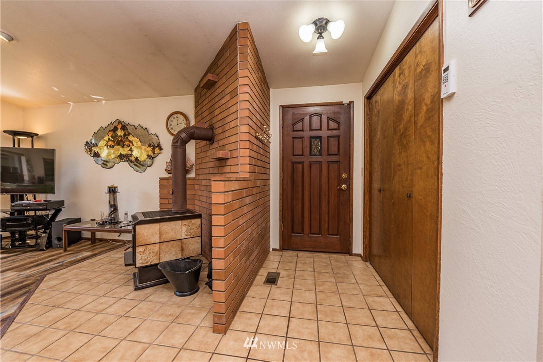 2522 Kitchen-Dick Road Sequim, WA 98382 - Photo 8 of 39 a view of an entryway with wooden floor
