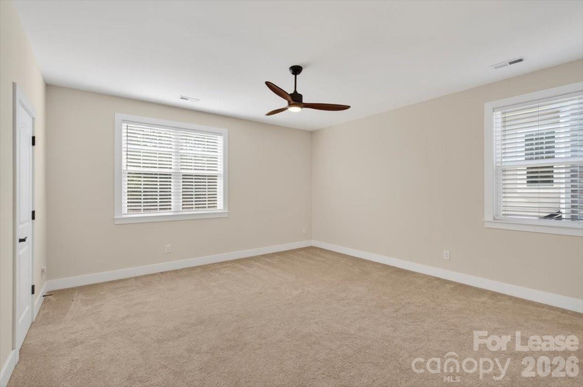 5201 Valley Stream Road Charlotte, NC 28209 - Photo 17 of 47 a view of an empty room with a window