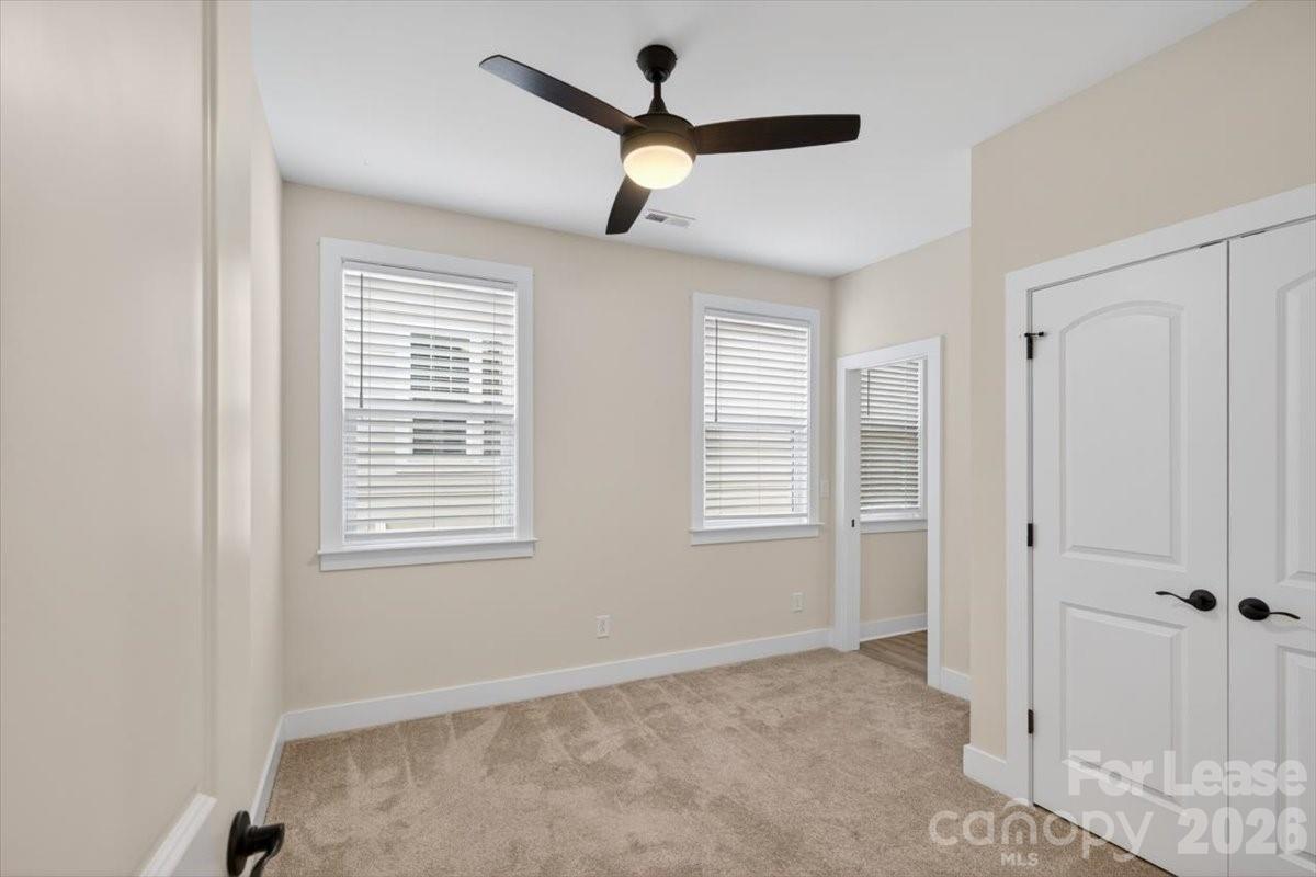 5201 Valley Stream Road Charlotte, NC 28209 - Photo 20 of 47 a view of an empty room with a window
