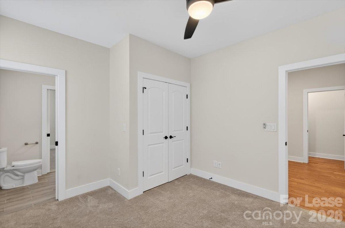 5201 Valley Stream Road Charlotte, NC 28209 - Photo 21 of 47 a view of empty room with wooden floor