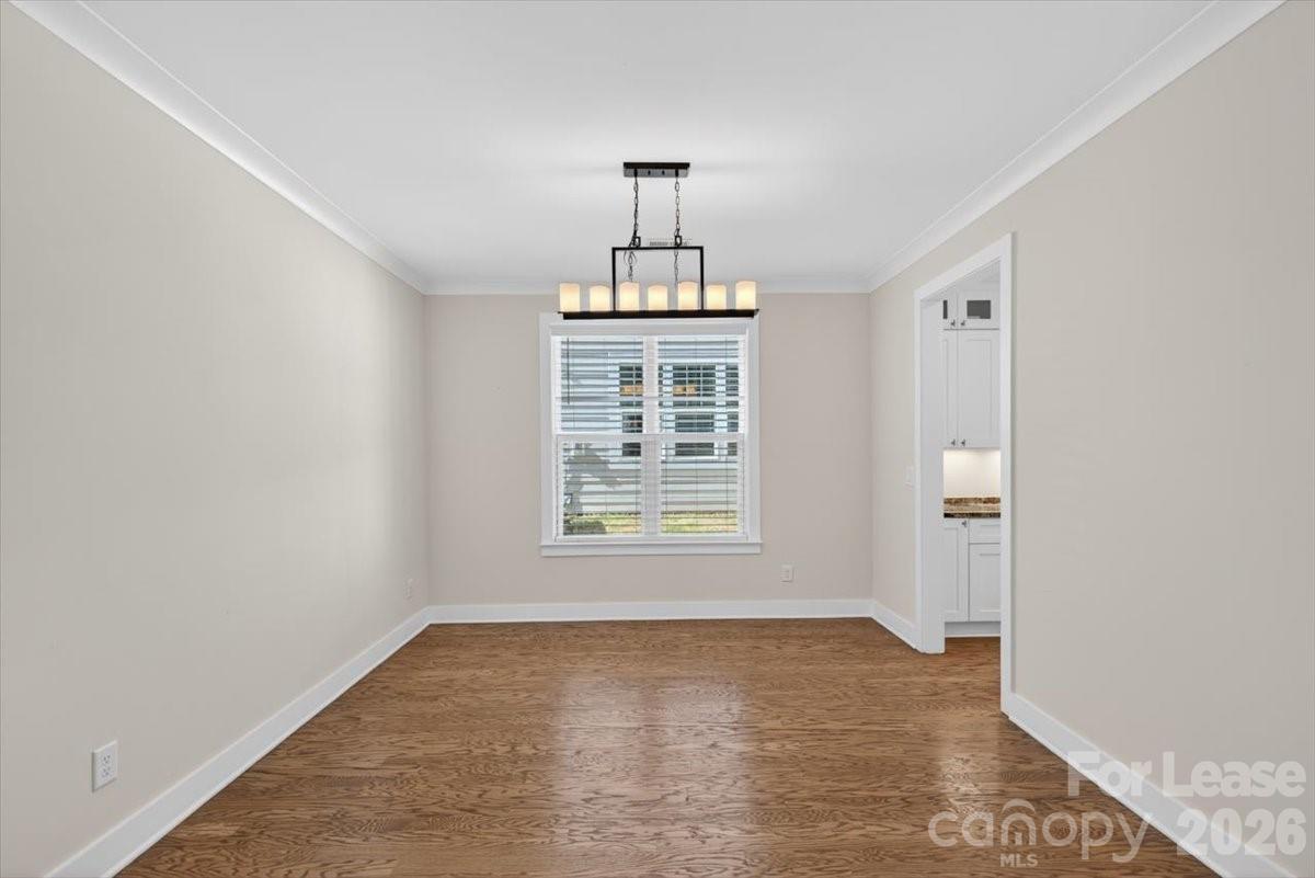 5201 Valley Stream Road Charlotte, NC 28209 - Photo 46 of 47 a view of an empty room with a window