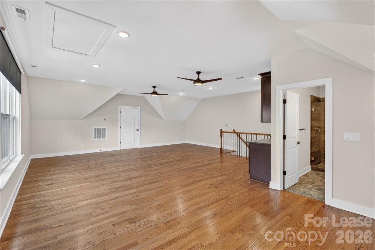 5201 Valley Stream Road Charlotte, NC 28209 - Photo 7 of 47 a view of empty room with wooden floor