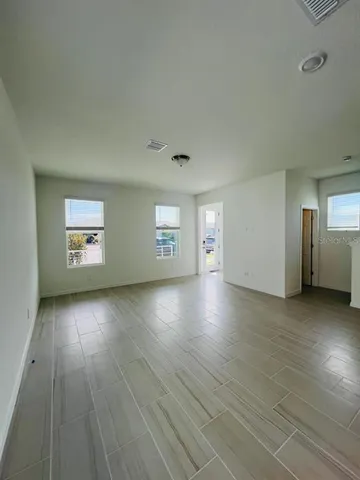 a kitchen with a sink cabinets and window
