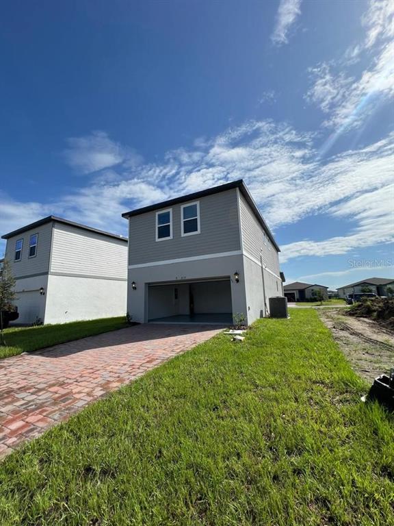4638 Homestead Trail St. Cloud, FL 34772 - Photo 29 of 30 a view of a backyard of the house