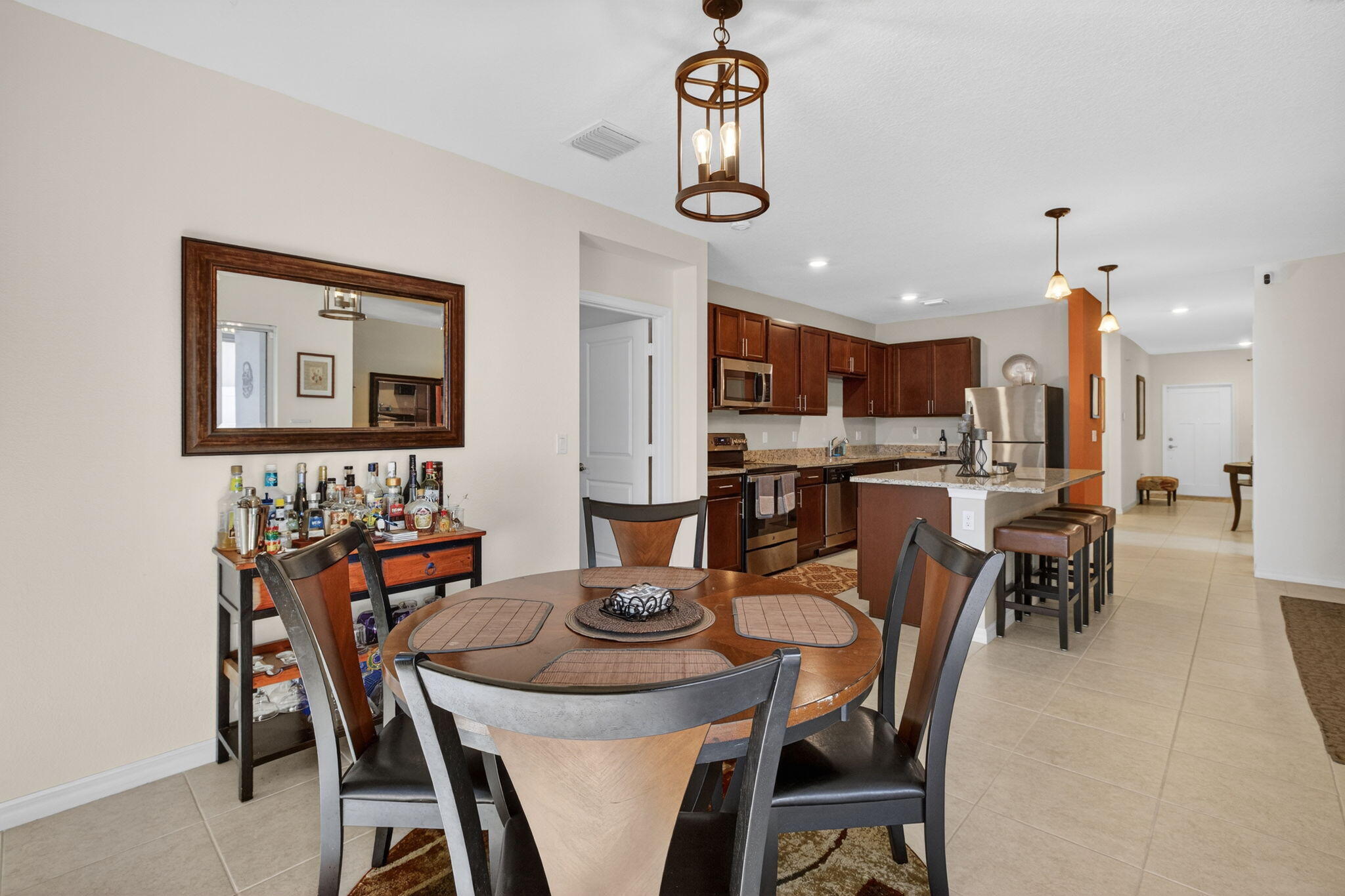 5221 Armina Place Fort Pierce, FL 34951 - Photo 12 of 40 a view of a dining room with furniture