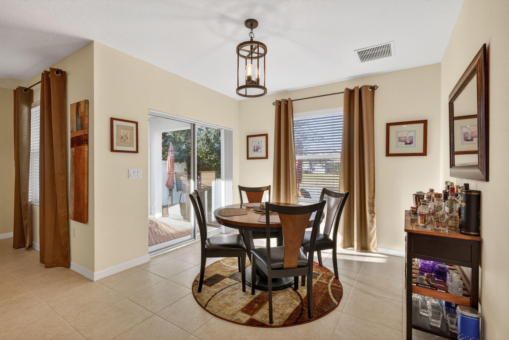 5221 Armina Place Fort Pierce, FL 34951 - Photo 13 of 40 a view of a dining room with furniture window and outside view