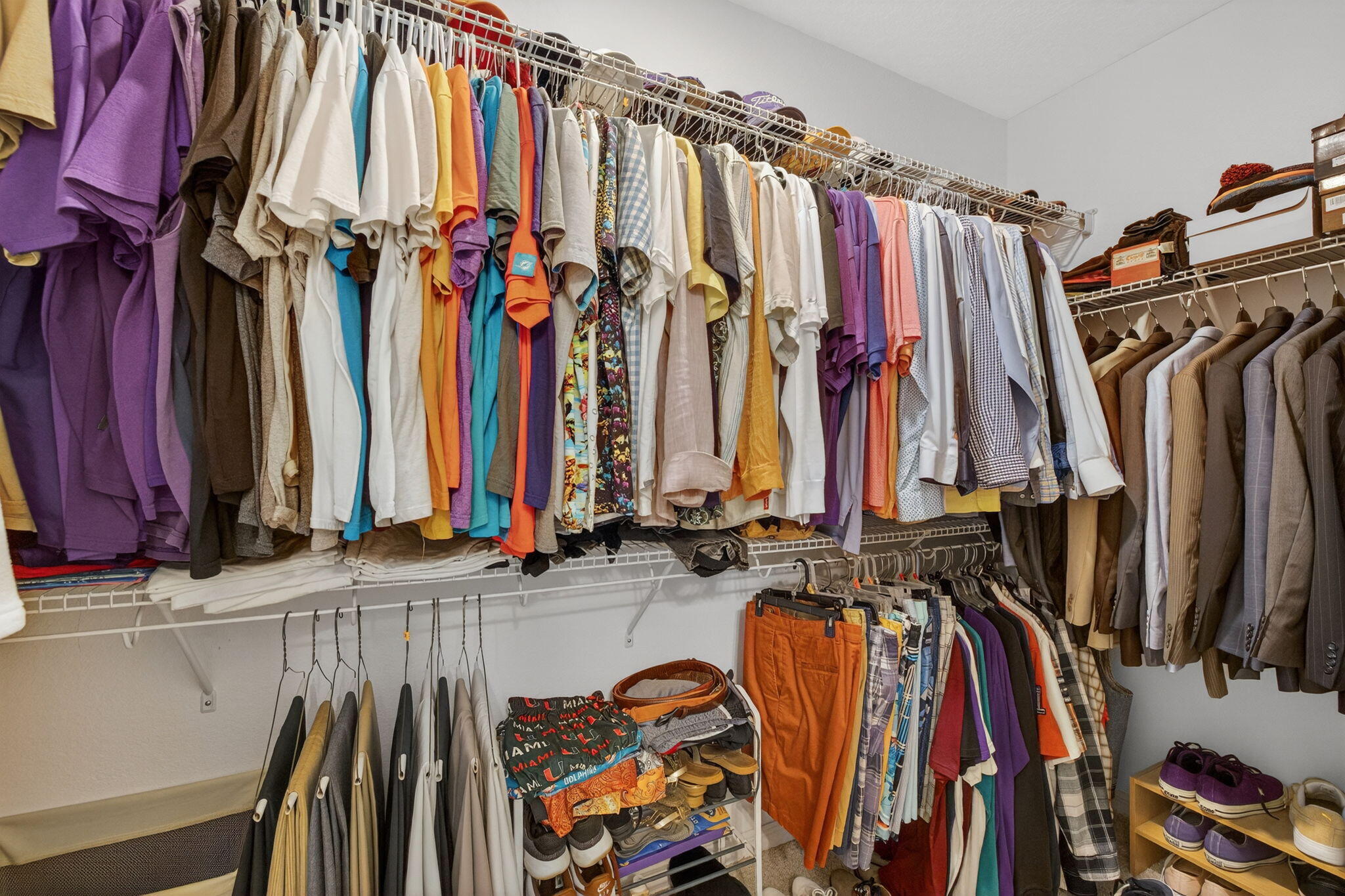 5221 Armina Place Fort Pierce, FL 34951 - Photo 19 of 40 a view of walk in closet with clothes