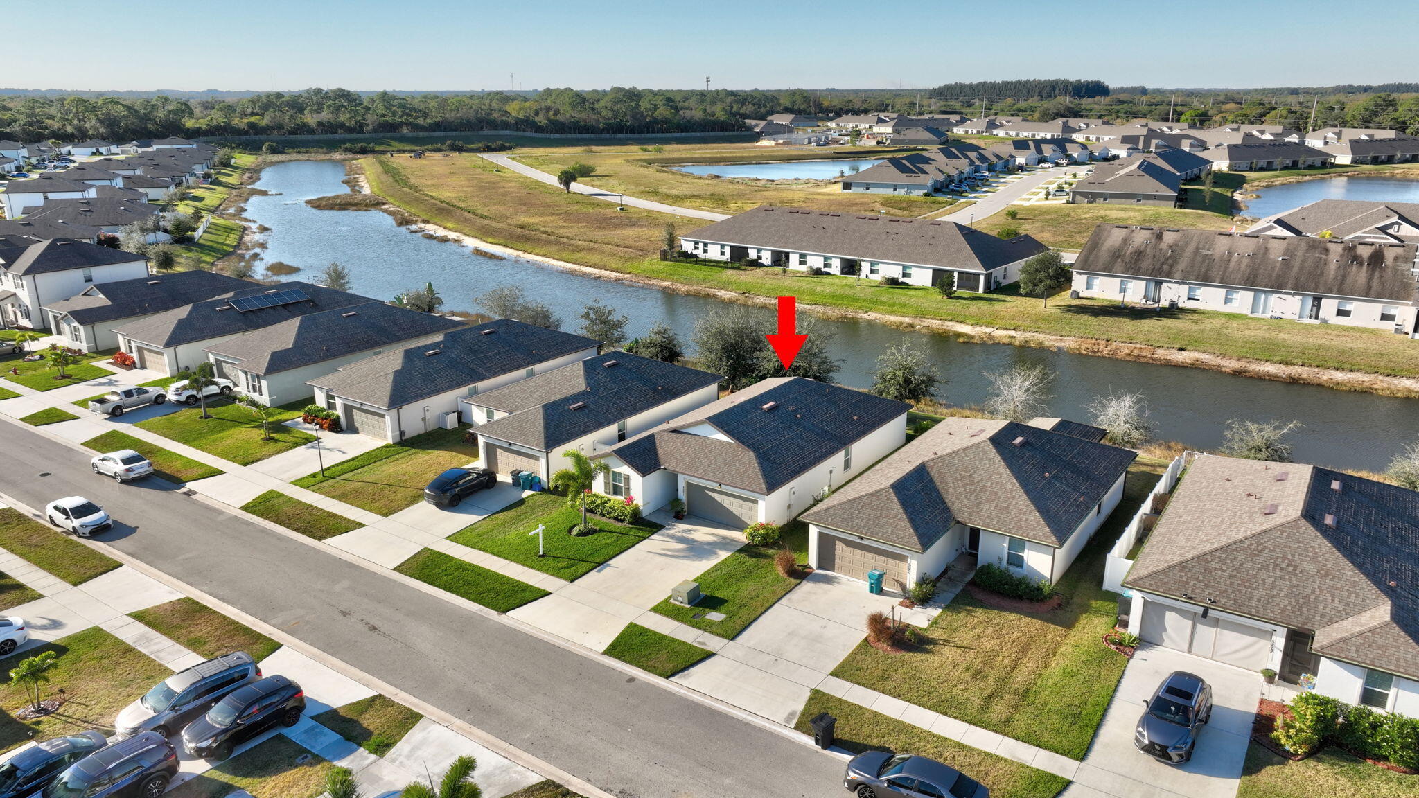 5221 Armina Place Fort Pierce, FL 34951 - Photo 39 of 40 an aerial view of houses with yard