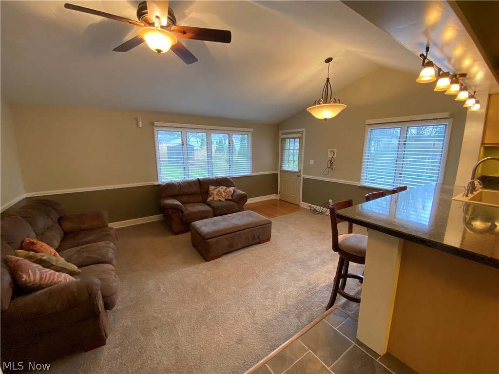1589 Overbrook Road Lyndhurst, OH 44124 - Photo 13 of 32 Large family room with vaulted ceiling, tons of natural light and door leading to backyard.