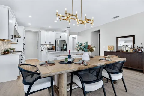 a bedroom with furniture and flat screen tv