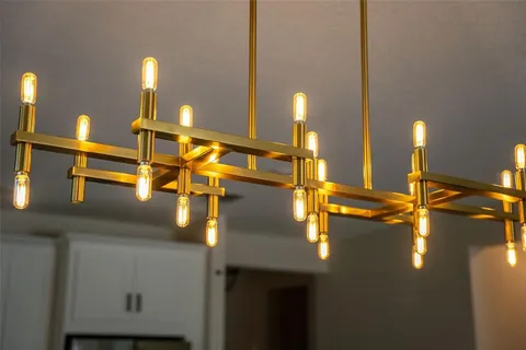 a bedroom with bed tv and window