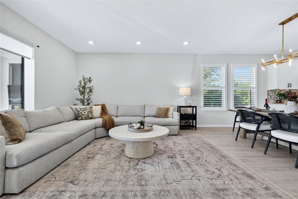 16106 Culpepper Drive Lakewood Ranch, FL 34211 - Photo 46 of 99 a living room with furniture and a large window