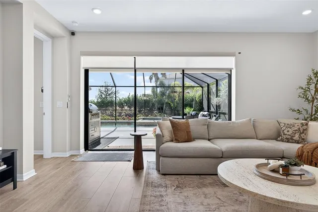 an aerial view of a house with a ocean view