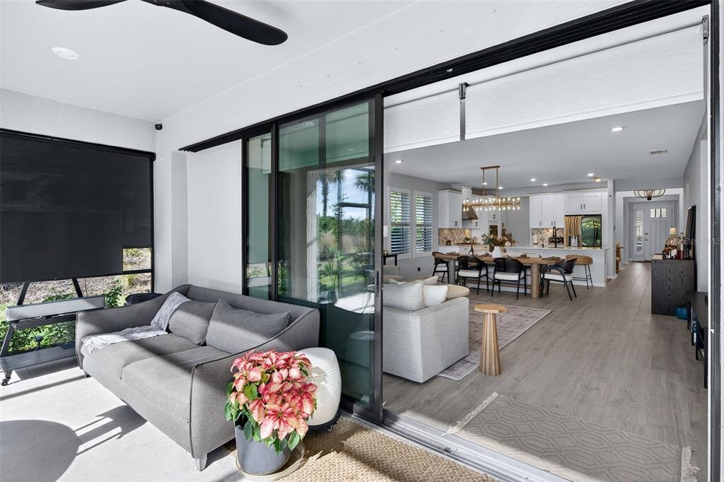16106 Culpepper Drive Lakewood Ranch, FL 34211 - Photo 50 of 99 a living room with furniture and a flat screen tv